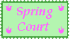 Stamp with dark green border, pastel green background, and pink letters reading Spring Court, with small pink flowers at each corner.